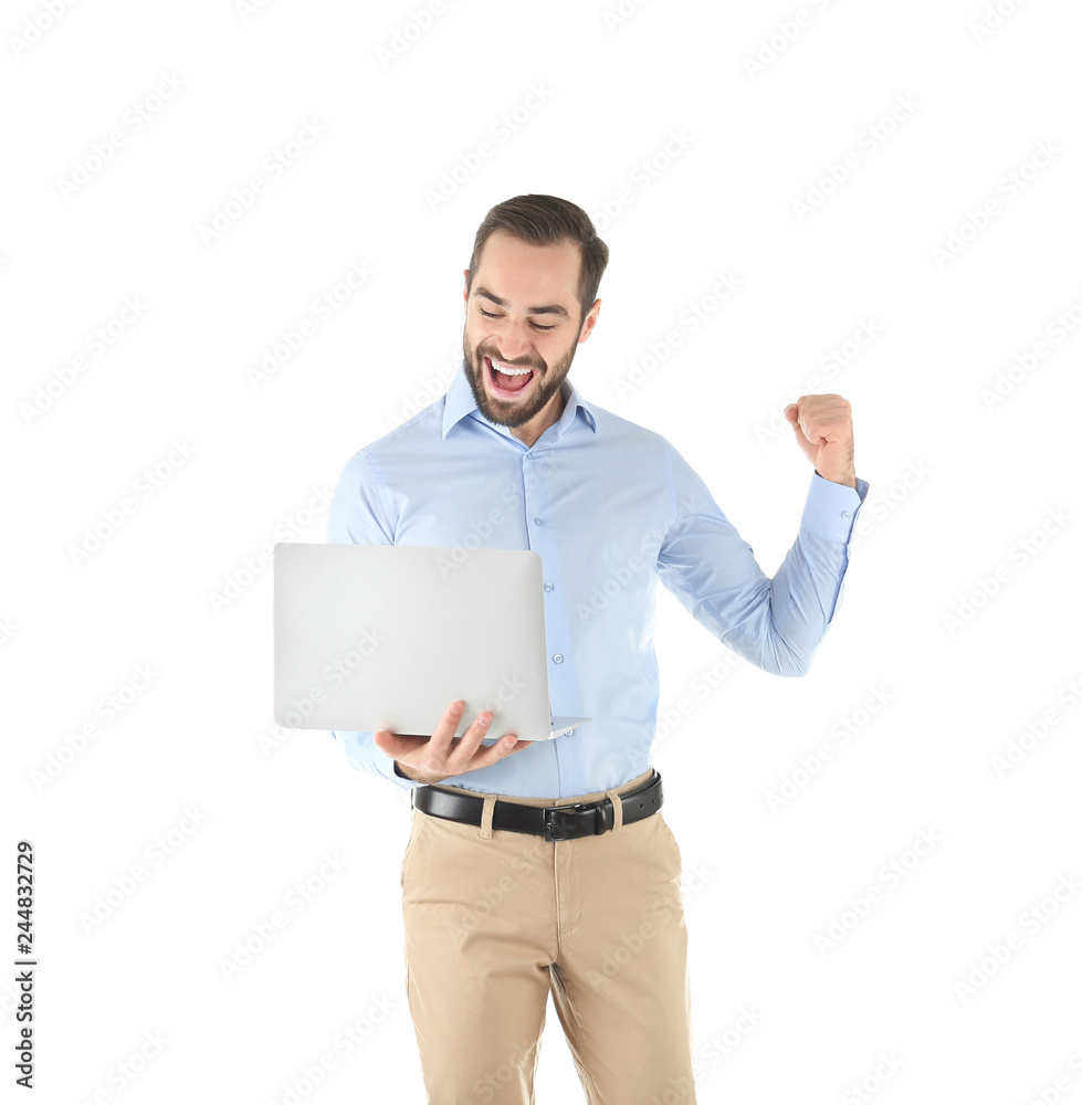 Emotional young man with laptop celebrating victory on white background Emotional young man with laptop celebrating victory on white background