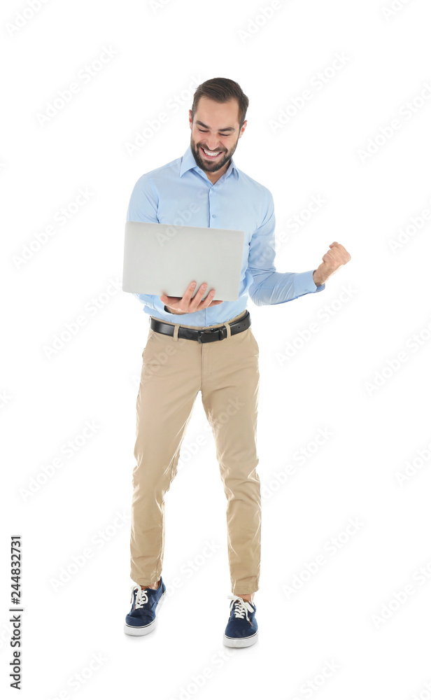 Emotional young man with laptop celebrating victory on white background Emotional young man with laptop celebrating victory on white background