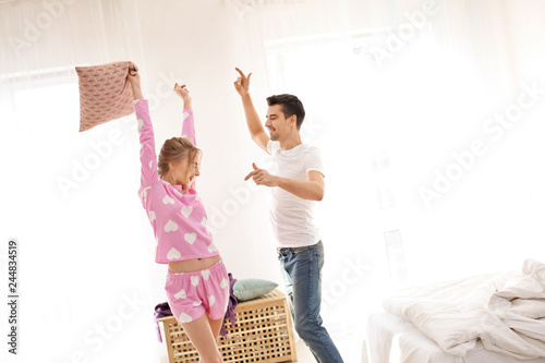 Cute young couple dancing i...
