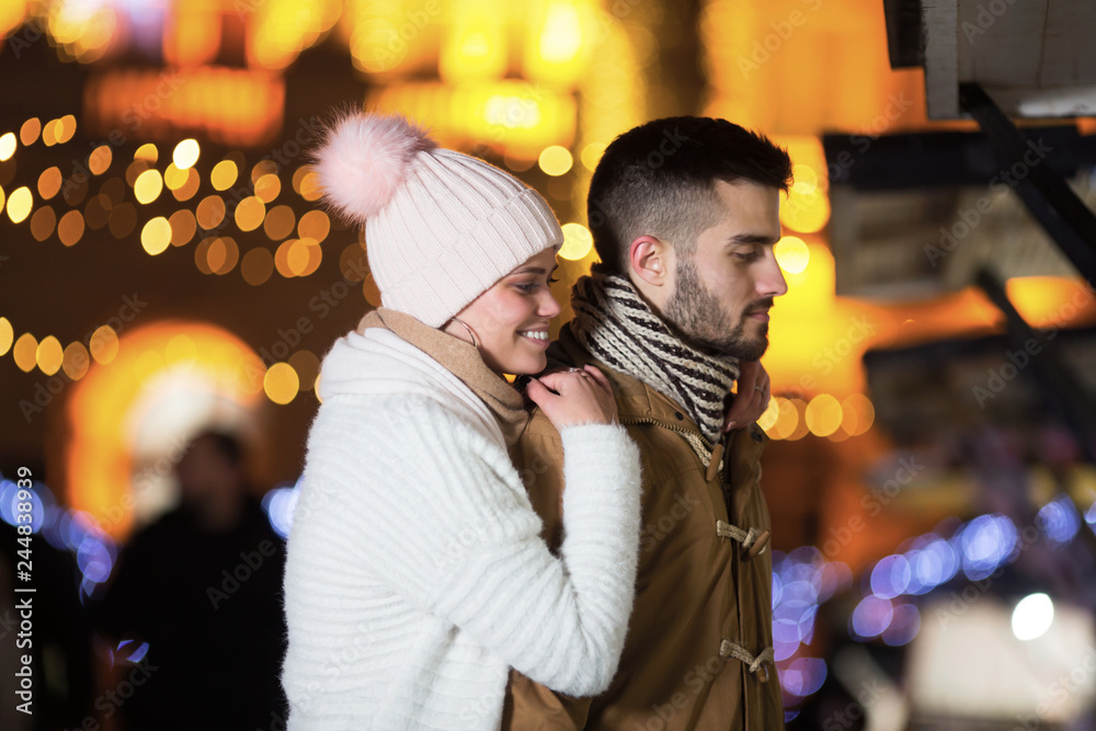 Happy young couple in winter