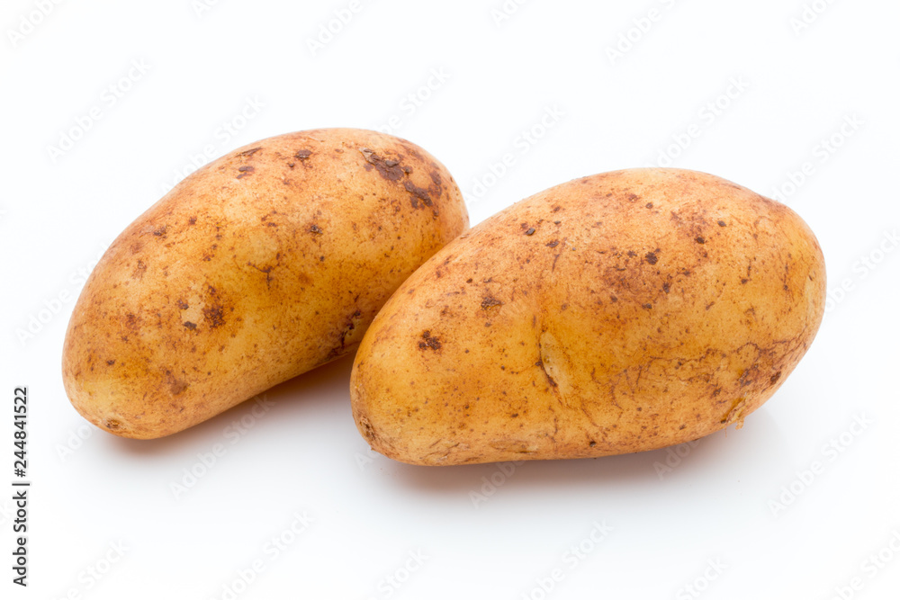 A bio russet potato isolated white background. A bio russet potato isolated white background.