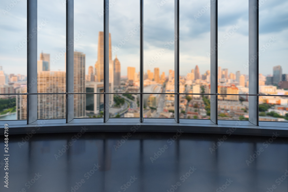 Fototapeta premium large windows with abstract cityscape