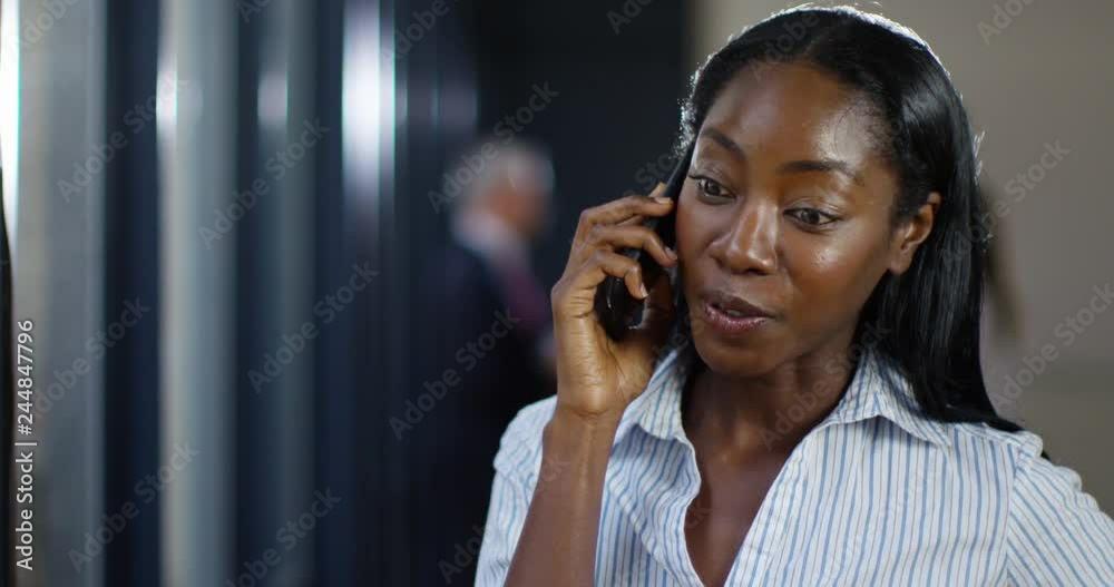 4K Close up beautiful smiling businesswoman talking on cell phone at business event. Slow motion.