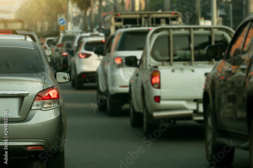 Transportation of cars on the road. Open light break waiting to release traffic signals in the intersection. Heading to travel or work. On the asphalt road. © thongchainak