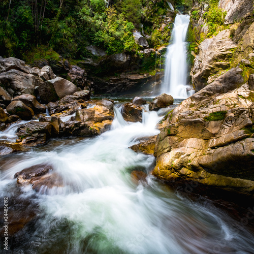 Beautiful waterfalls in the green nature  Wainui Falls  Abel Tasman  New Zealand.