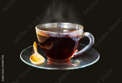 Cup of tea isolated on black background