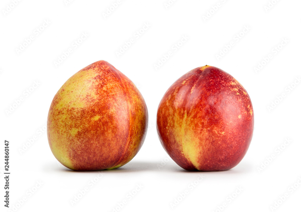 Fresh nectarine isolated on white background. Fresh nectarine isolated on white background.