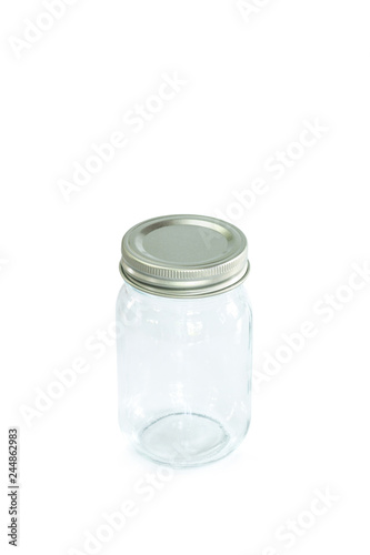 Empty jar of silver cap is open on a white background.