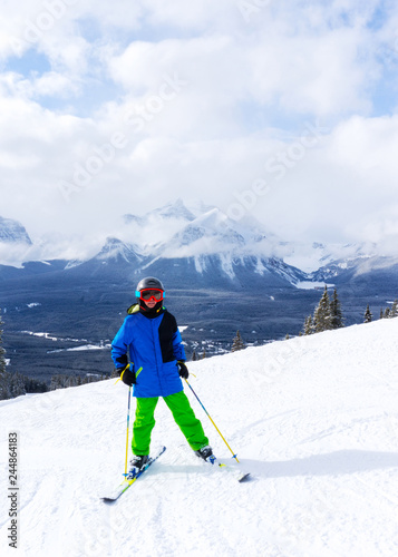 Young Skier on top of Mountain at Lake Louise in the Canadian Rockies