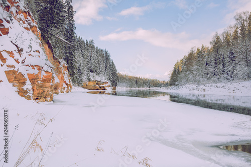 Red rocks and river Gauja. Many snow at winter 2019. Travel photo. photo