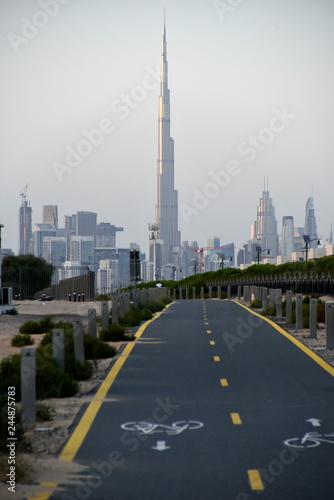 Dubai skyline from Nad Al Sheba bicycle track road, Dubai, United Arab Emirates photo
