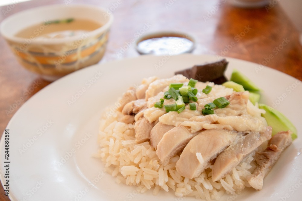 Thai rice steamed with chicken soup or Hainanese chicken rice.