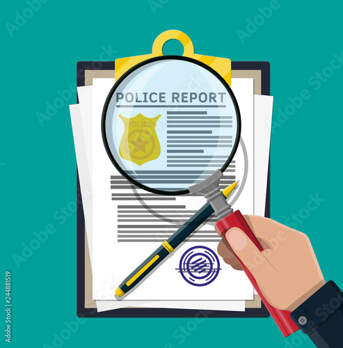 Clipboard with police report and pen.