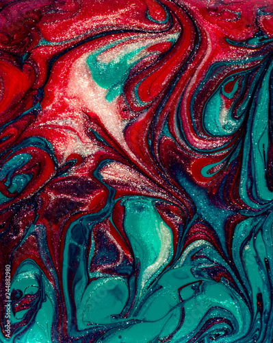 Vibrant green and purple marbling texture. Abstract colorful background. Liquid marble paint.