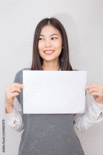 Business young asian women holding blank bill board a4 paper