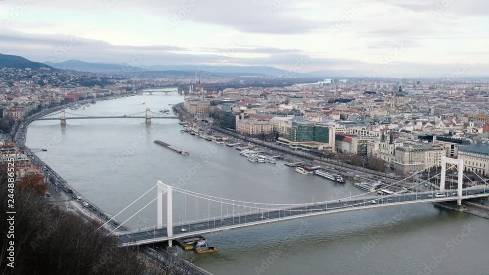 BUDAPEST, HUNGARY- JANUARY,2019: View to danube river and Erzsebet hid, beautiful bridge BUDAPEST, HUNGARY- JANUARY,2019: View to danube river and Erzsebet hid, beautiful bridge