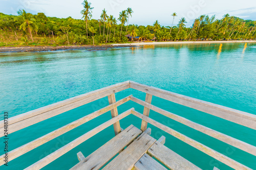 Wood bridge idyllic  sea beach turquoise water