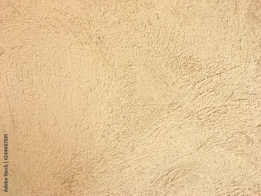 Rough light yellow concrete wall texture. Wrinkle pattern after plaster background. Rough light yellow concrete wall texture. Wrinkle pattern after plaster background.