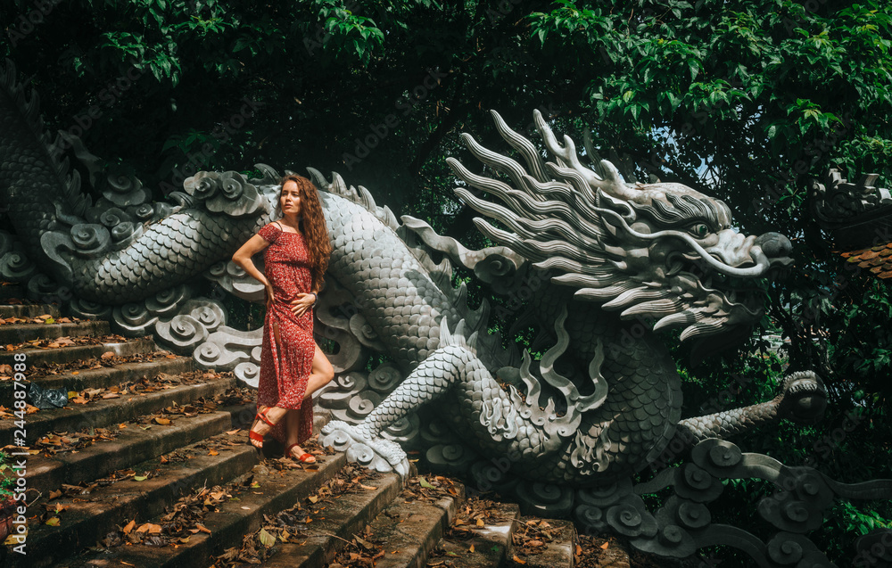 Fototapeta premium girl, dragon, background, stone, beautiful, young, art, woman, blue, black, decoration, old, travel, landscape, tree, outdoor, architecture, grass, building, traditional, house, garden, tourism, cultu