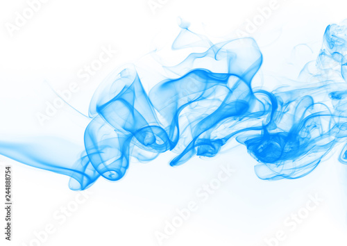 Blue smoke abstract on white background. ink water on white