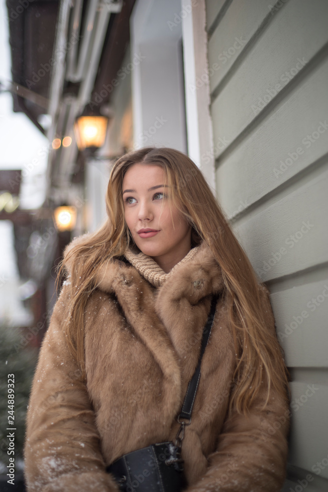 girl in a fur coat walking girl in a fur coat walking