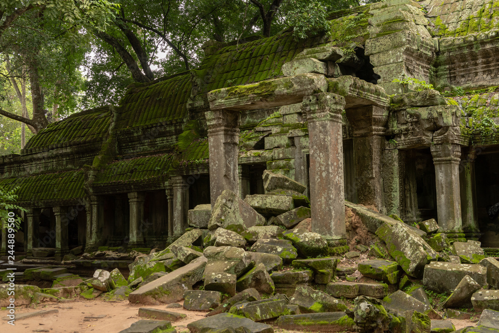 Temple colonnade with entrance blocked by rocks