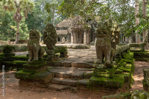 Stone lions and snake heads guard temple