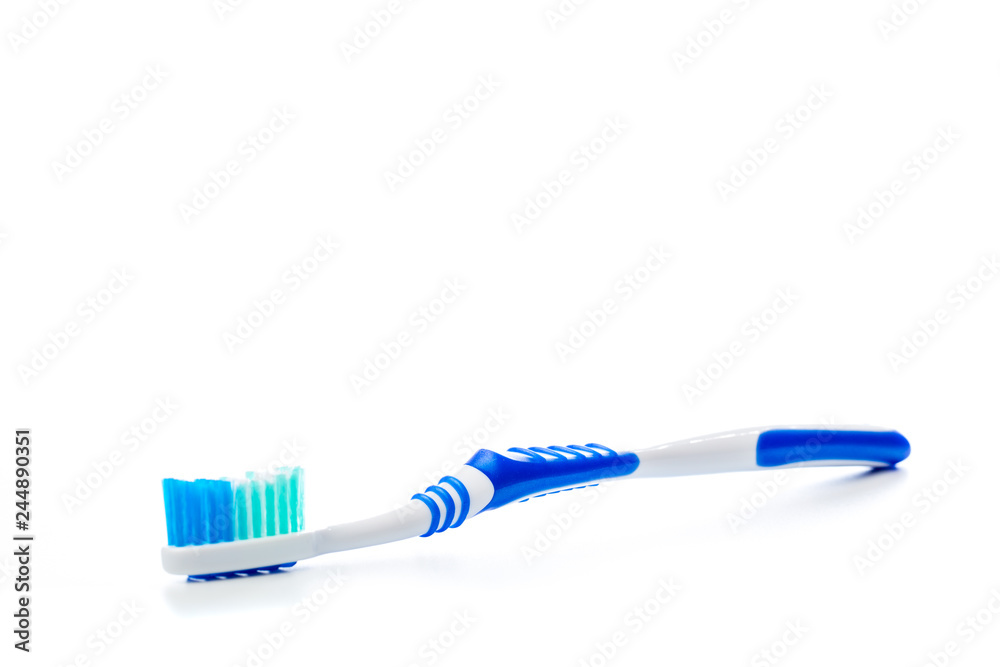 colored toothbrush on an isolated background, close up colored toothbrush on an isolated background, close up