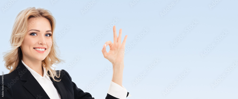 businesswoman showing okay gesture