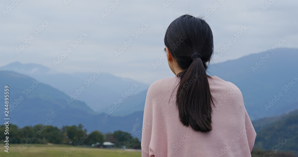 Woman enjoy the view in Luye highland at Taitung
