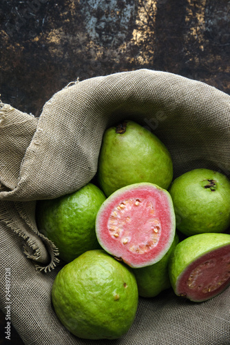 Fresh ripe guava on rustic background