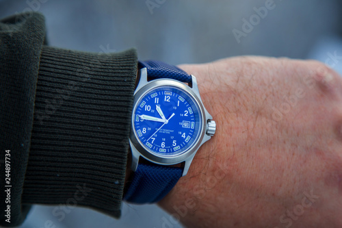 Analog watch with blue face