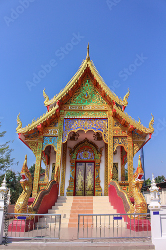 Sri Don Thong Temple on clear sky background in Lamphun province, Thailand © Amphawan