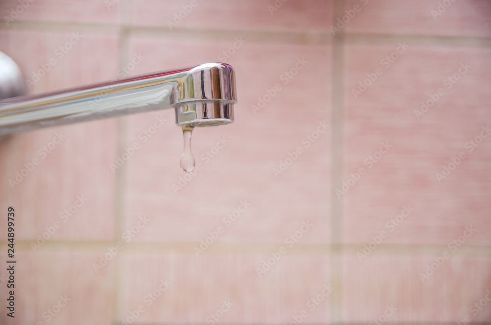 Drop on tap closeup Drop on tap closeup