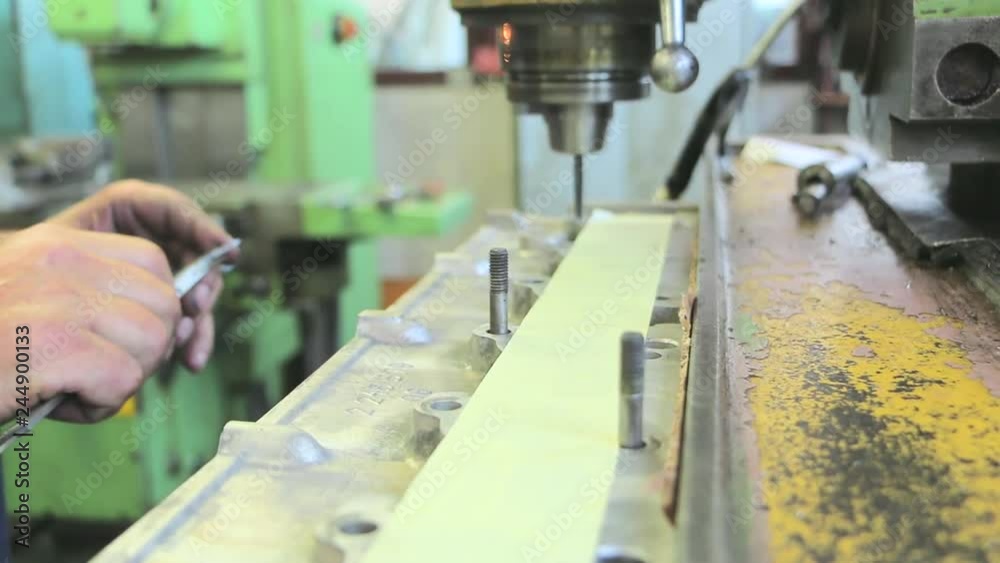 Car engine repair in factory. Engine cylinder head and block repair process Car engine repair in factory. Engine cylinder head and block repair process