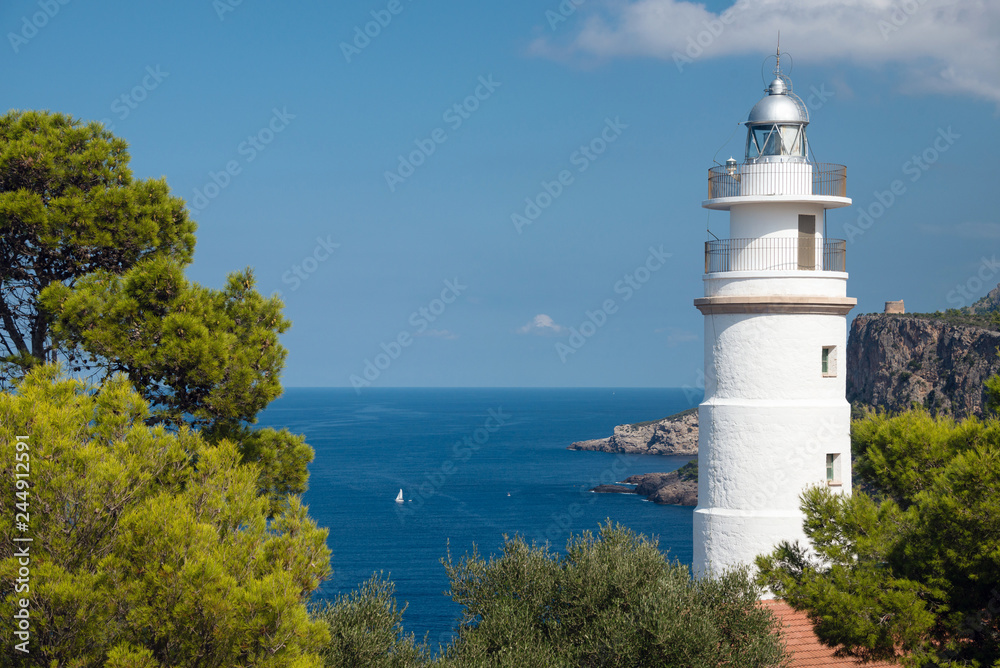 Cap Gros lighthouse on hill in Port Soller, Mallorca Island, Spain