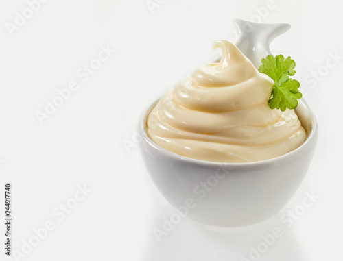 Twirled spicy mayonnaise served in a spoon