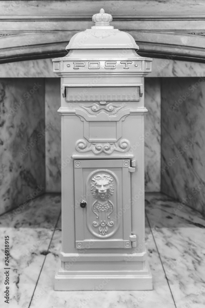 Traditional vintage white post box used at a wedding to receive thank you cards