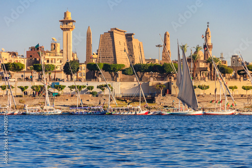 Luxor Temple is a large Ancient Egyptian temple complex on east bank of Nile river in Luxor (ancient Thebes). View from Nile river