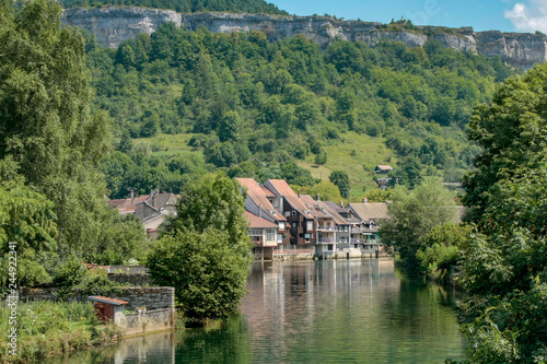 Ornans France 09-15-2018. Houses on river la Loue in Ornans France photo