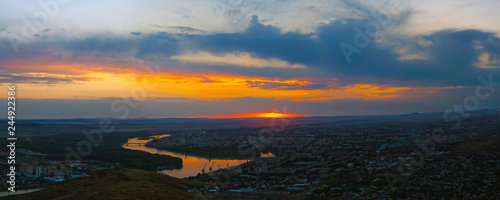 beautiful sunset view over the city of Ust-Kamenogorsk and the Irtysh River, Kazakhstan photo