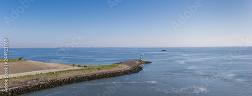 Pier in the Wadden sea at Den Helder, Netherlands photo