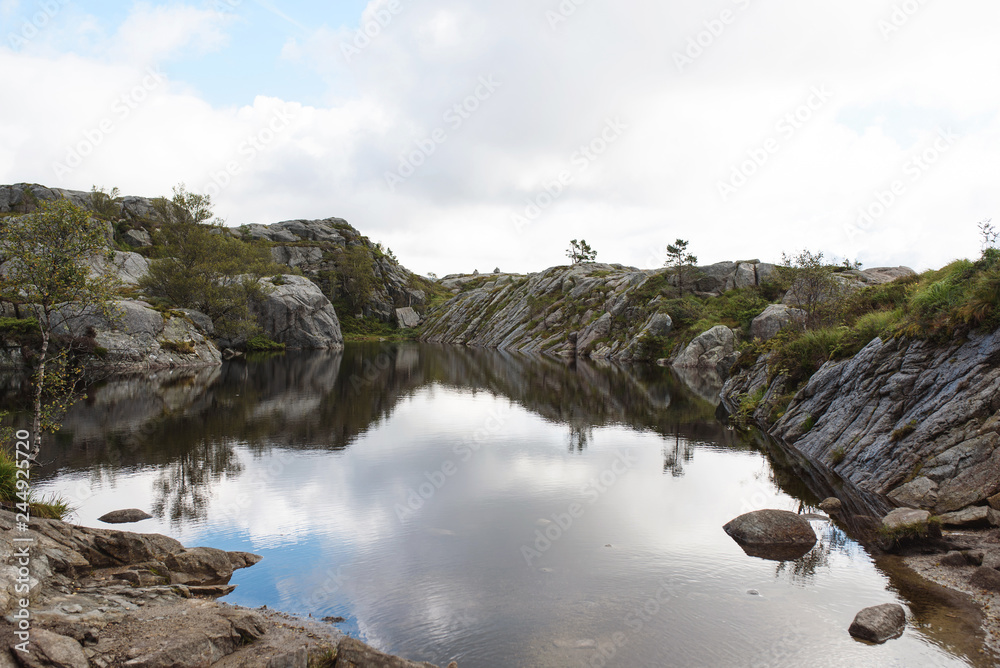 Fototapeta premium stone shore of lake in mountains