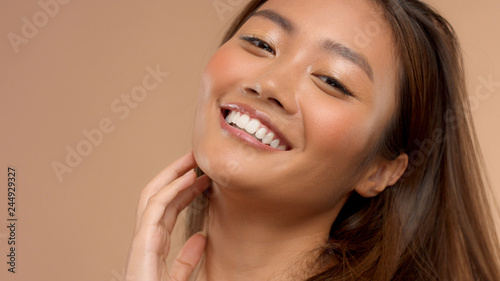 closeup portrait o asian thai japanese model happy laughing