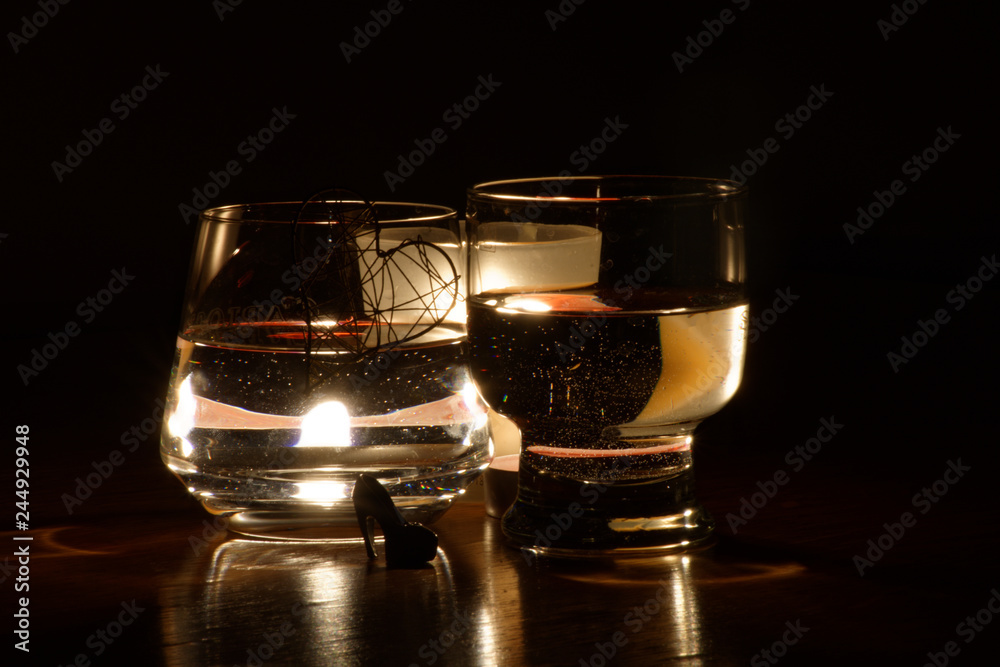 beautiful glasses in the flame of a candle beautiful glasses in the flame of a candle