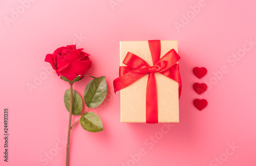 Giving present and celebration concept at Valentine's day, anniversary, mother's day and birthday surprise on pink background, copyspace, topview © RomixImage