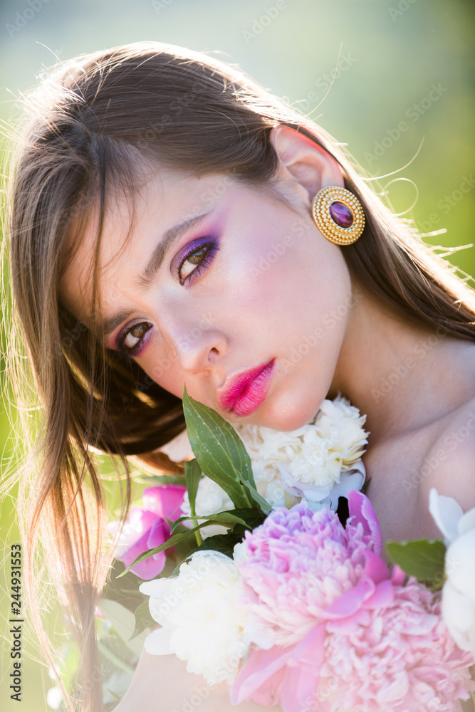 Face and skincare. flowers. In great mood. Travel in summer. Summer girl with long hair. Spring woman. Springtime and vacation. Natural beauty and spa therapy. Woman with fashion makeup Face and skincare. flowers. In great mood. Travel in summer. Summer girl with long hair. Spring woman. Springtime and vacation. Natural beauty and spa therapy. Woman with fashion makeup
