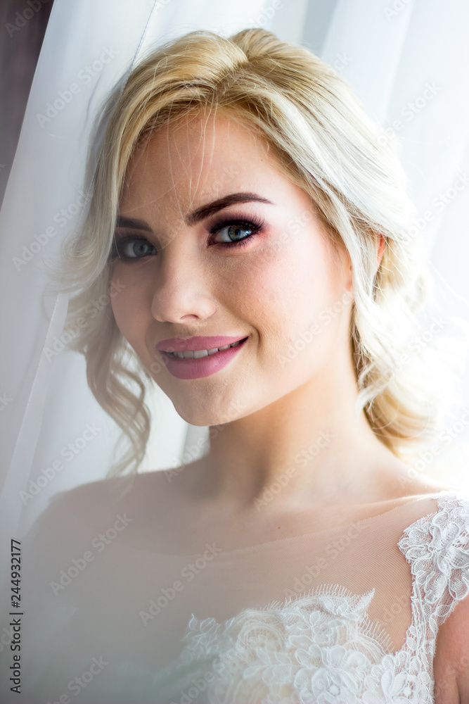 Portrait of a blond girl in a negligee. Portrait of a blond girl in a negligee.