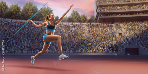 Young black female javelin thrower throwing a spear. Athlete in sport clothes at athletic sport track in professional stadium