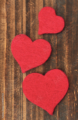 Red hearts with wooden background  valentine s background